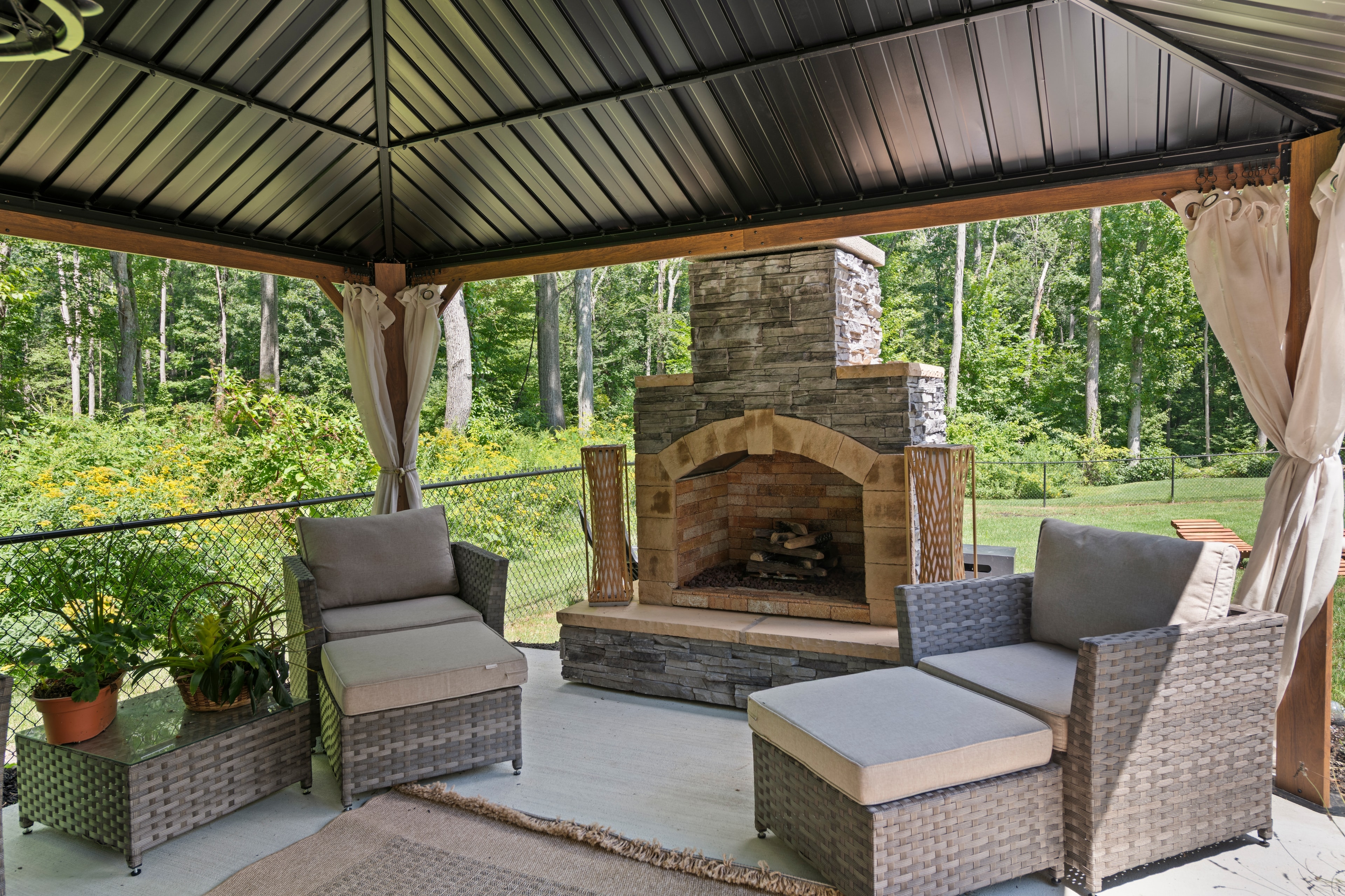 Covered patio with fireplace